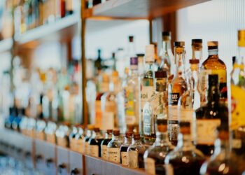 liquor bottles on rack