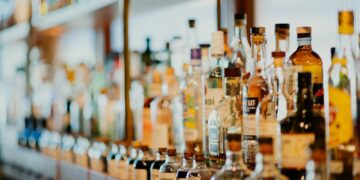 liquor bottles on rack