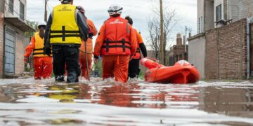 Rescue team in action during flooding in Buenos Aires, aiding relief efforts in affected neighborhoods.